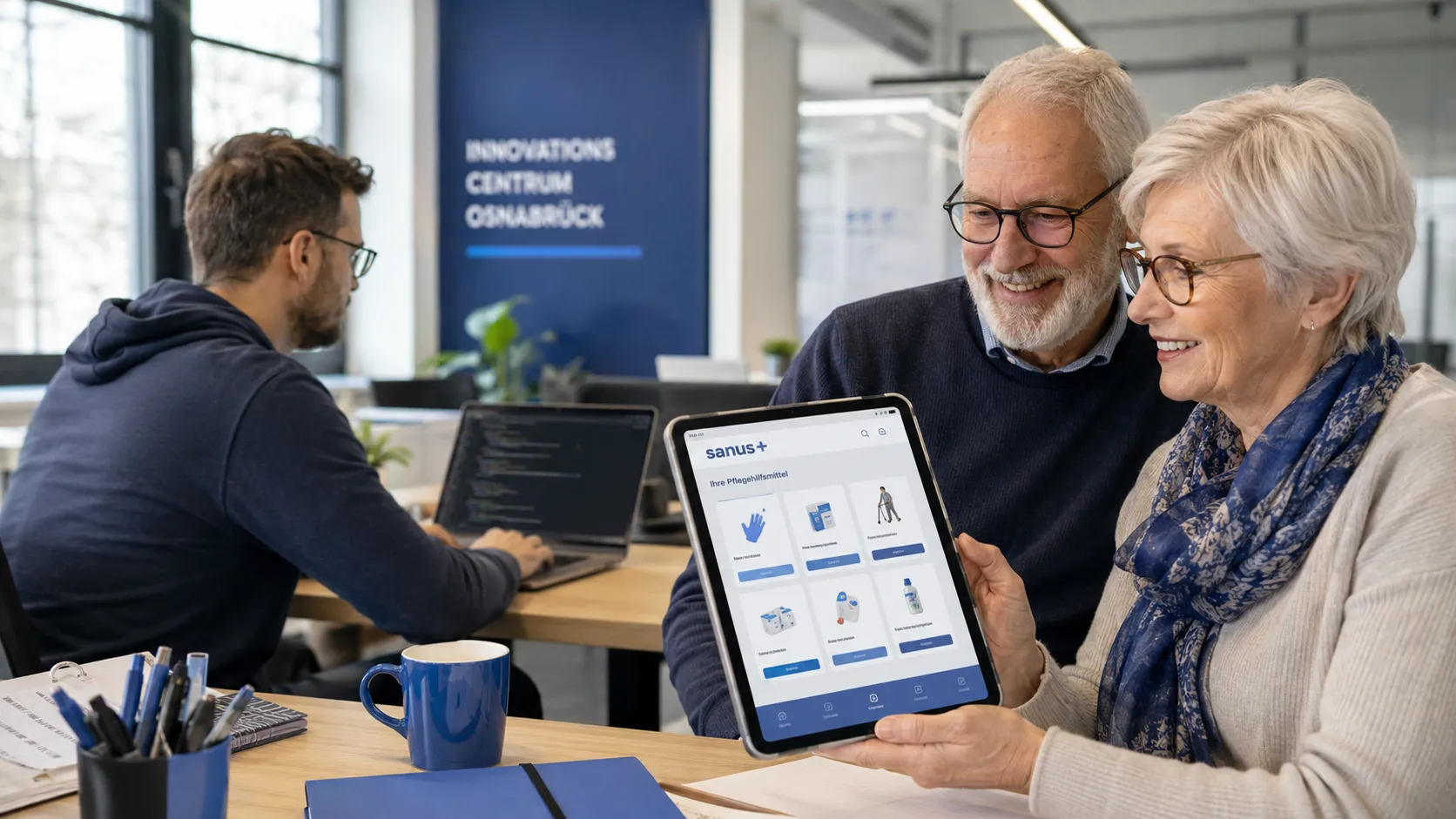 Senior:innen schauen sich die sanus+ App im Innovations Centrum Osnabrück an